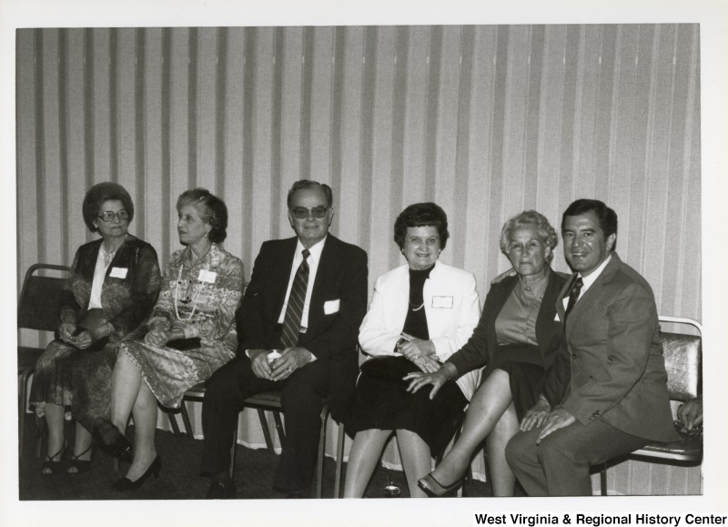 On the far right, Representative Nick J. Rahall (D-W.Va.) with an unidentified man and four unidentified women associated with the Raleigh County Democratic Women's Club.
