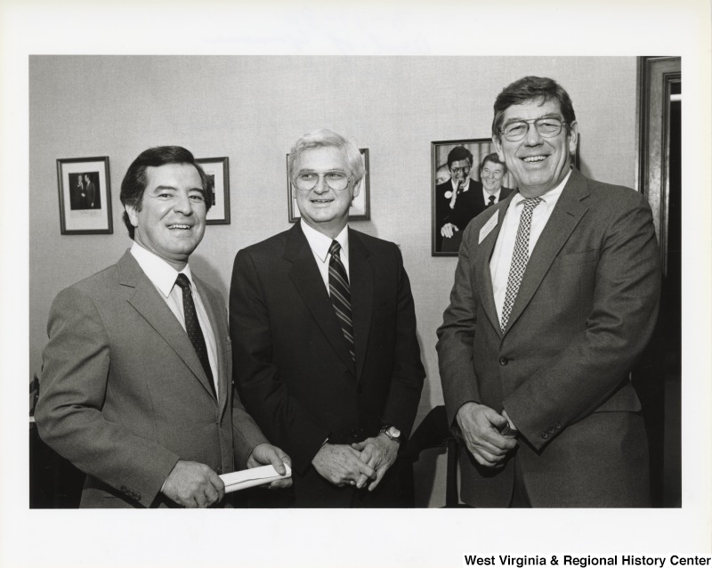 L-R: Representative Nick J. Rahall (D-W.Va.), Representative Hal Rogers (R-Ky.), Deputy Secretary of Commerce Clarence BrownThe men smile for a photograph at the first day of the Federal Coal Export Commission meeting.
