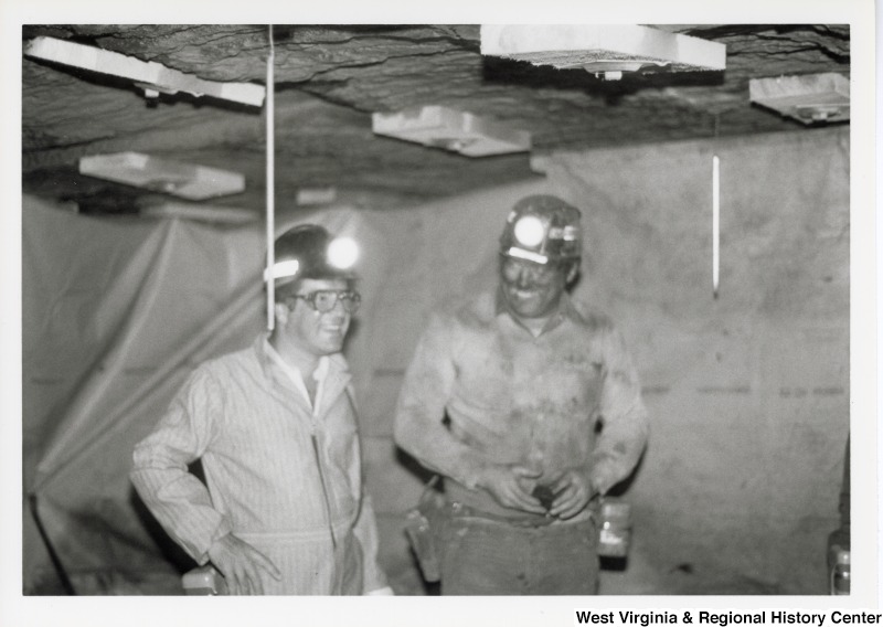 Congressman Nick Rahall dressed in a coal miner uniform inside of Old Ben Coal Mine with an unidentified coal miner