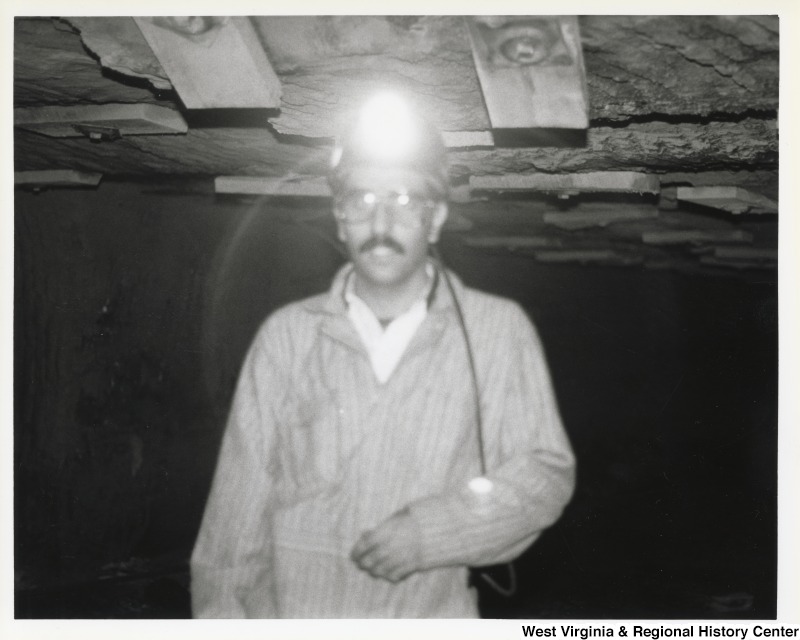 An unidentified coal miner in a mine during Congressman Nick Rahall's mine visit.