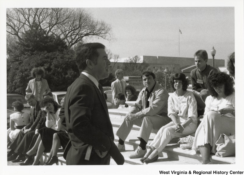 Congressman Nick Rahall speaking to an unidentified crowd outside of the United States Capitol.