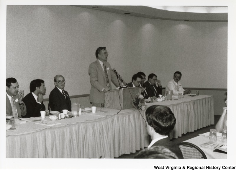 Unidentified man speaking at an Economic Development Seminar attended by Congressman Nick Rahall in Bluefield, West Virginia.