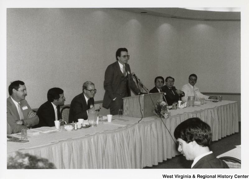 Unidentified man speaking at an Economic Development Seminar attended by Congressman Nick Rahall in Bluefield, West Virginia.