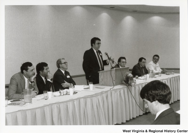 Unidentified man speaking at an Economic Development Seminar attended by Congressman Nick Rahall in Bluefield, West Virginia