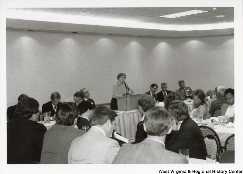 Unidentified woman speaking at an Economic Development Seminar attended by Congressman Nick Rahall in Bluefield, West Virginia.