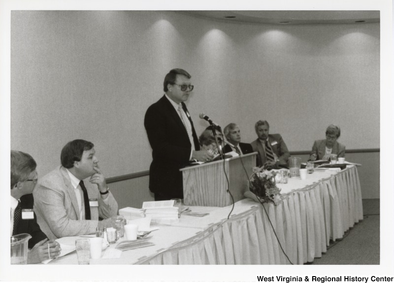 Unidentified man speaking at an Economic Development Seminar attended by Congressman Nick Rahall in Bluefield, West Virginia.