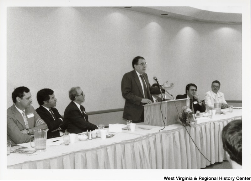 Unidentified man speaking at an Economic Development Seminar attended by Congressman Nick Rahall in Bluefield, West Virginia.