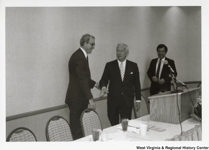 Congressman Nick Rahall with two unidentified men at an Economic Development Seminar in Bluefield, West Virginia.