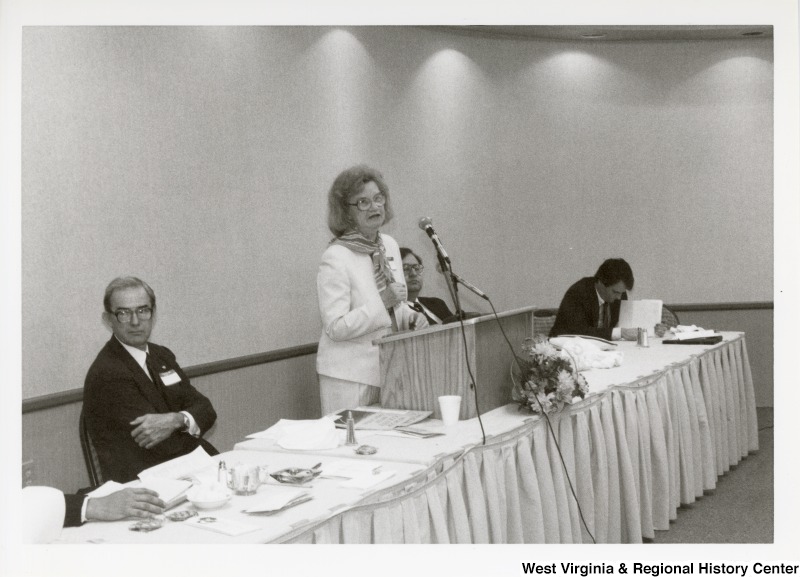 An unidentified woman speaking at an Economic Development Seminar attended by Congressman Nick Rahall in Bluefield, West Virginia.