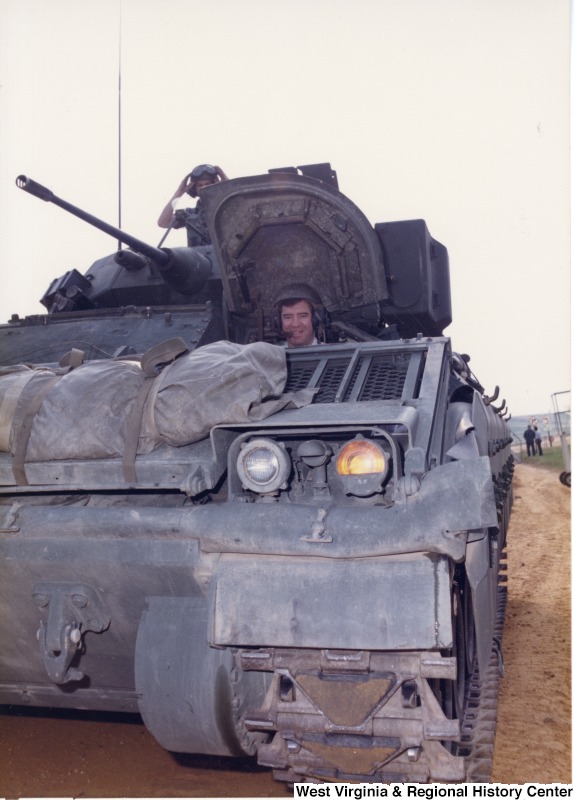 Congressman Nick Rahall inside a tank at Aberdeen Proving Ground.