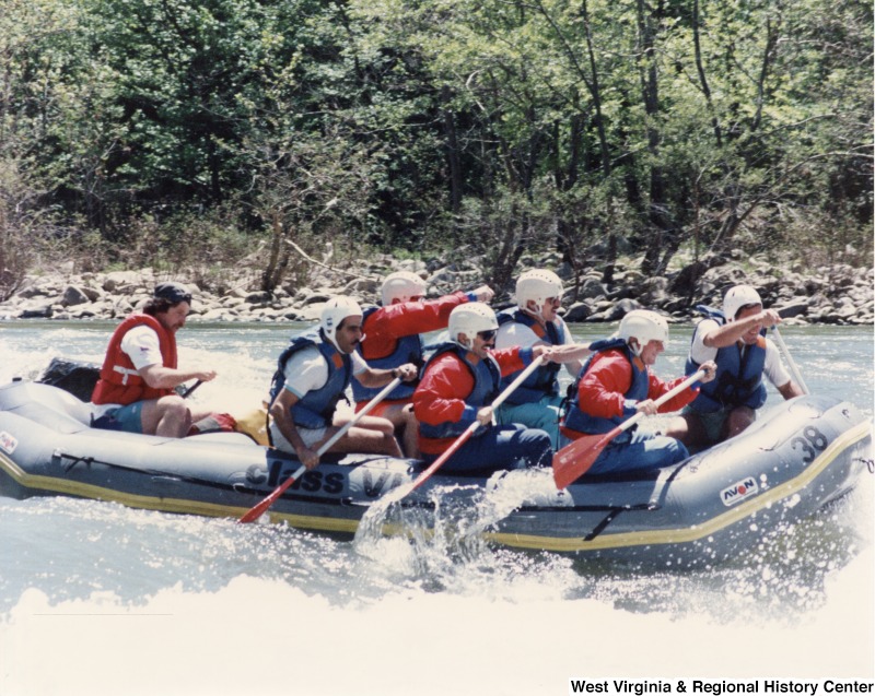 Nicholas Willis (front right), Congressman Rahall (front left), Ambrose Ethington and Tony Culley-Foster (second row), Gerry Burkot and Clyde Walton (back row) rafting the New River Gorge River, West Virginia.
