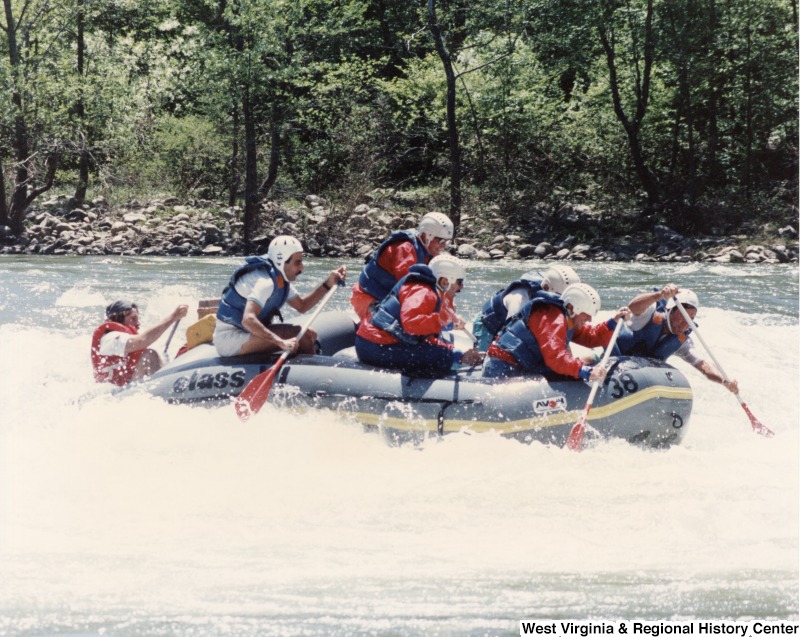 Nicholas Willis (front right), Congressman Rahall (front left), Ambrose Ethington and Tony Culley-Foster (second row), Gerry Burkot and Clyde Walton (back row) rafting the New River Gorge National River, West Virginia.