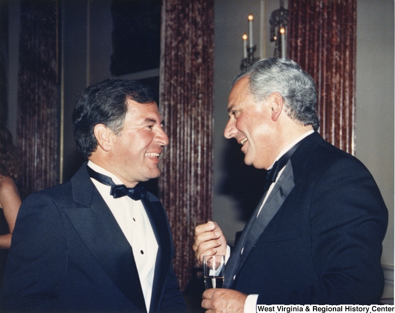 Congressman Nick Rahall speaking with Nicholas Mills, Managing Director and CEO of BET Public Limited Company of the United Kingdom at a Department of State Dinner in Washington, D.C.