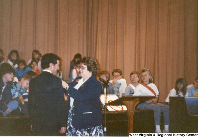 Congressman Nick Rahall receiving a pin an Monroe Elementary School.