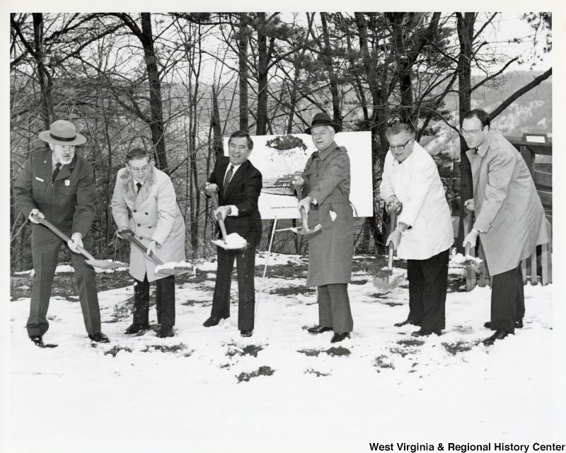 Congressman Nick Rahall (D-WV),  Senator Robert C. Byrd (D-WV) and United States Park Service Sergeant, Joe Kennedy and three unidentified men participating in the Groundbreaking ceremony for Canyon Rim Visitor Center, New River Gorge.