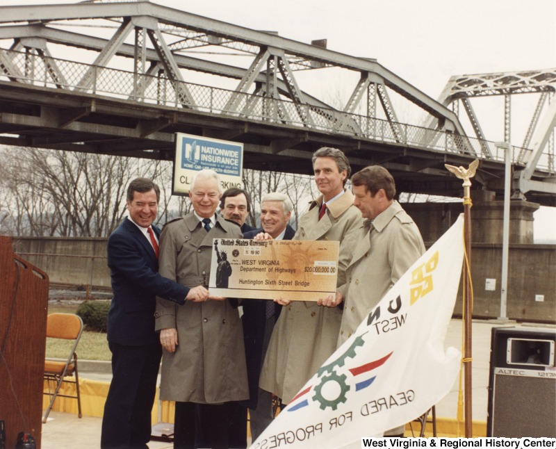 Congressman Nick Rahall (D-WV), Senator Robert C. Byrd (D-WV), Mayor of Chesapeake, OH, Mayor Robert Nelson (D-WV), Governor Gaston Caperton (D-WV), and Secretary of Transportation Samuel Skinner at the 6th Street Bridge 20 million dollar check presentation.