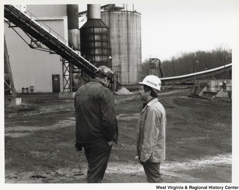 Congressman Nick Rahall (D-WV) with an unidentified man at a mine site.