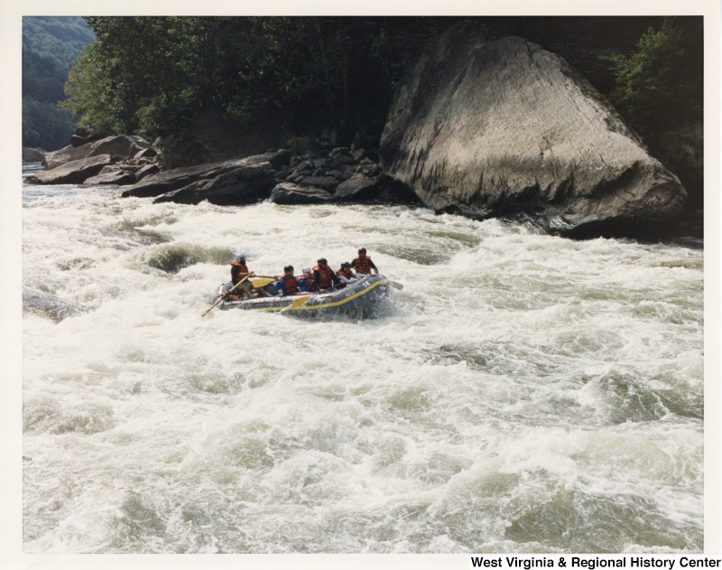 Congressman Nick Rahall (front row far right) rafting on the New River with Manny Lujan (front row far left), United States Secretary of the Interior, and a group of unidentified people.