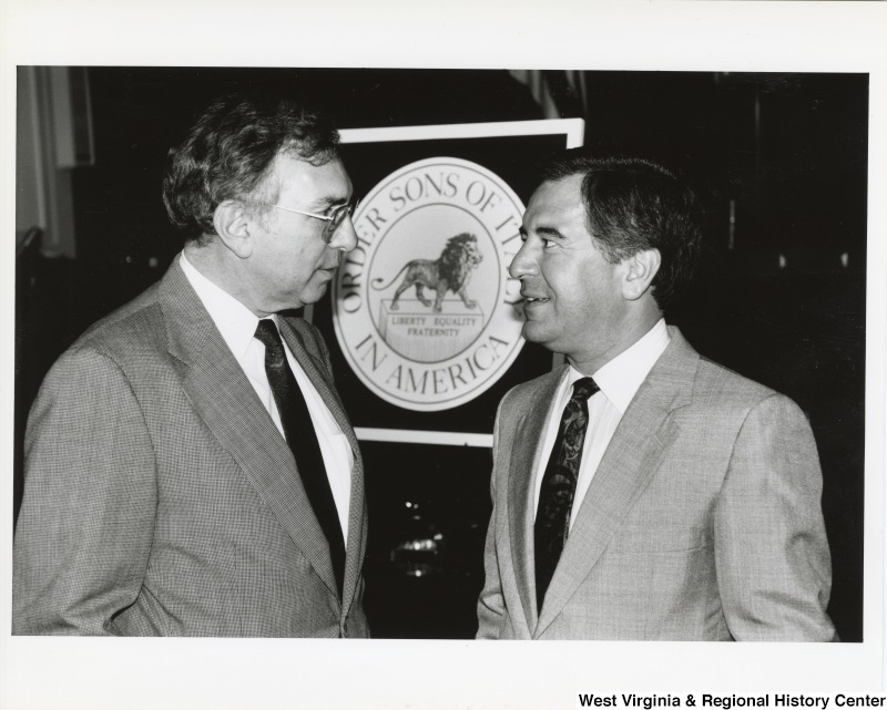 Congressman Nick Rahall (D-WV) with an unidentified man at a National Italian American Foundation meeting.