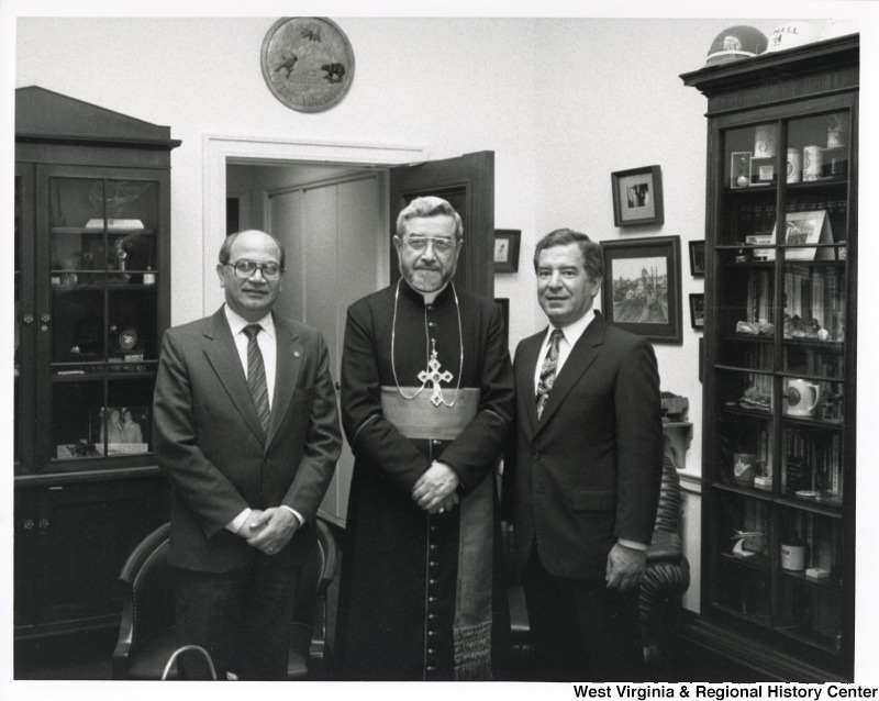 From left to right: unidentified man, unidentified man in religious attire, Congressman Nick Rahall (D-WV).