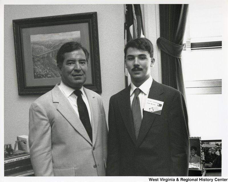 On the left, Representative Nick J. Rahall (D-W.Va.) stands beside an unidentified man who is a part of t he National Young Leaders Conference.