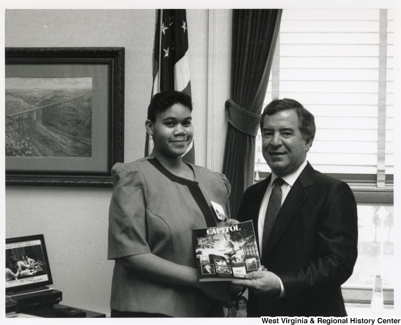 On the right, Representative Nick J. Rahall (D-W.Va.) smiles for a picture with an unidentified young woman from the Close-Up Washington D.C. program.