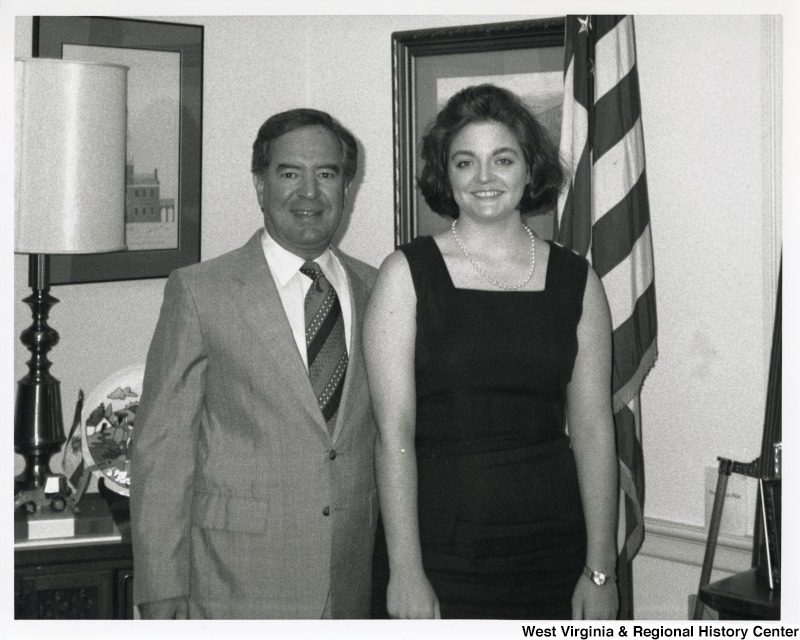On the left, Representative Nick J. Rahall (D-W.Va.) stands for a photograph with an unidentified woman.