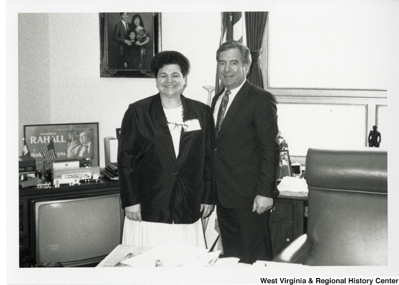 Congressman Nick Rahall (D-WV) with an unidentified woman in his office.