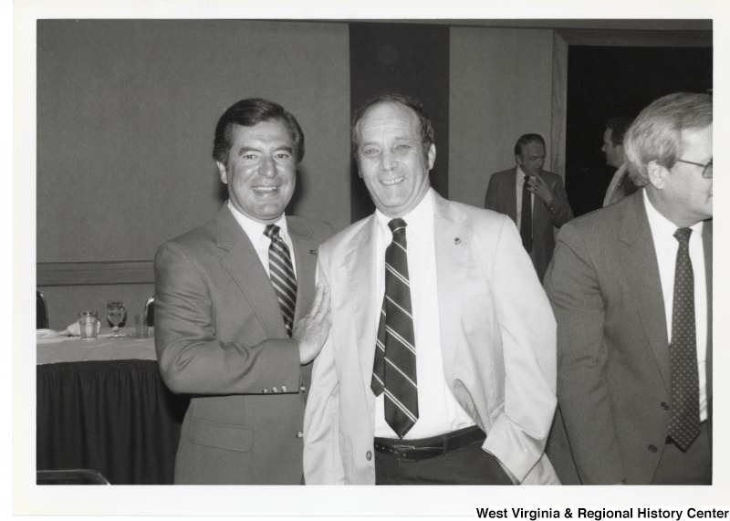 Congressman Nick Rahall (D-WV) with an unidentified man at a reception.
