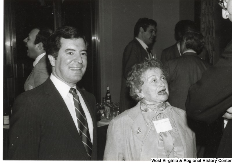 Congressman Nick Rahall (D-WV) with an unidentified woman at a reception.