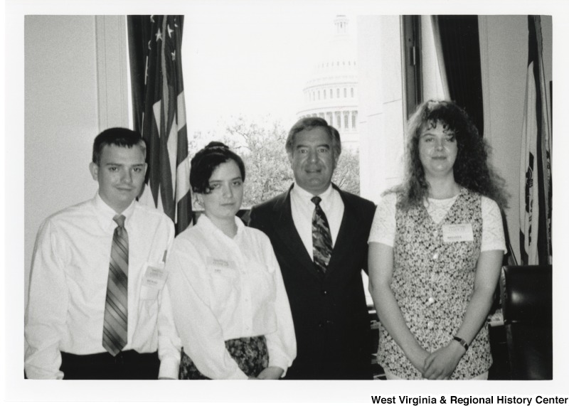 Congressman Nick Rahall (D-WV) with three unidentified students in D.C. office.