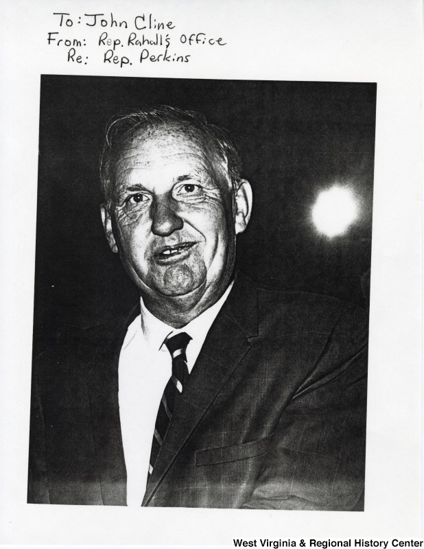 Congressman Carl Perkins (D-KY).The photograph is signed: "To: John Cline From: Rep. Rahall's Office Re: Rep. Perkins"