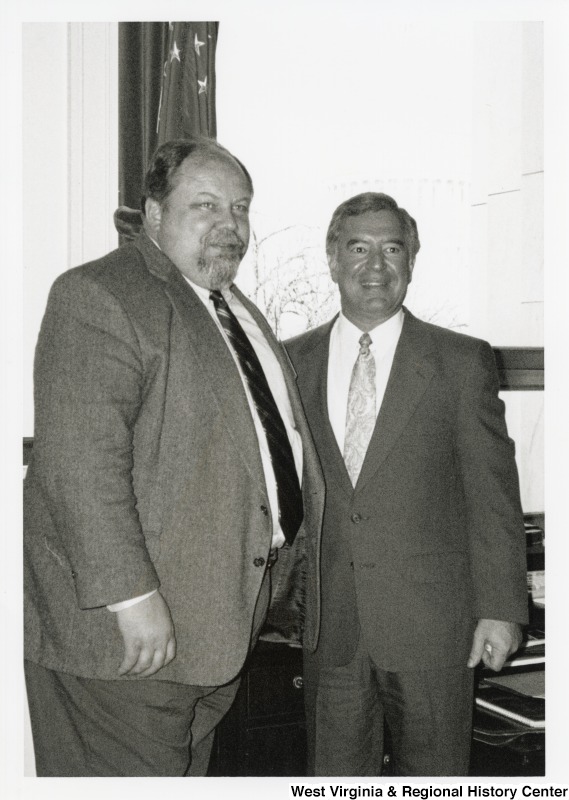 Representative Nick J. Rahall (D-W.Va.) stands for a photograph in his office with Nolan Grubb of the Southwestern Community Action Council.