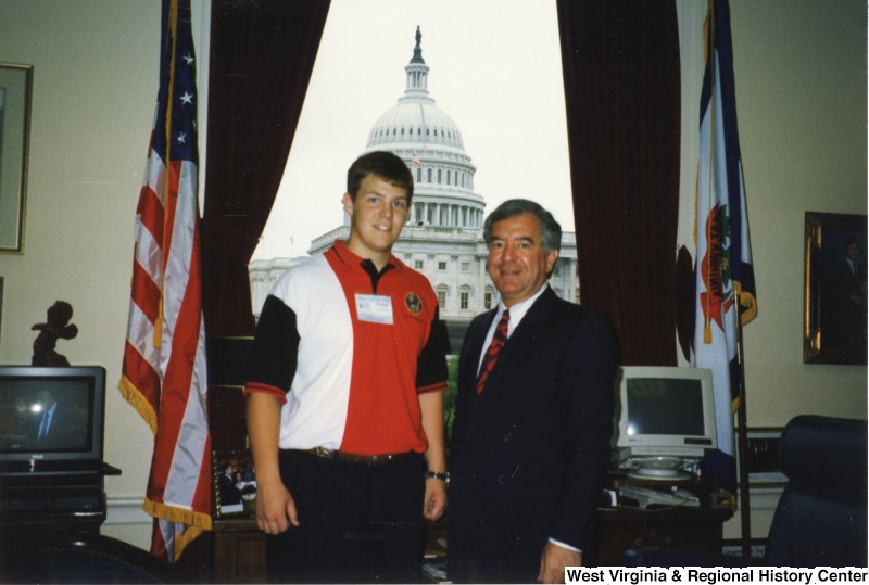 Congressman Nick Rahall (D-WV) with an unidentified young man in his D.C. office.