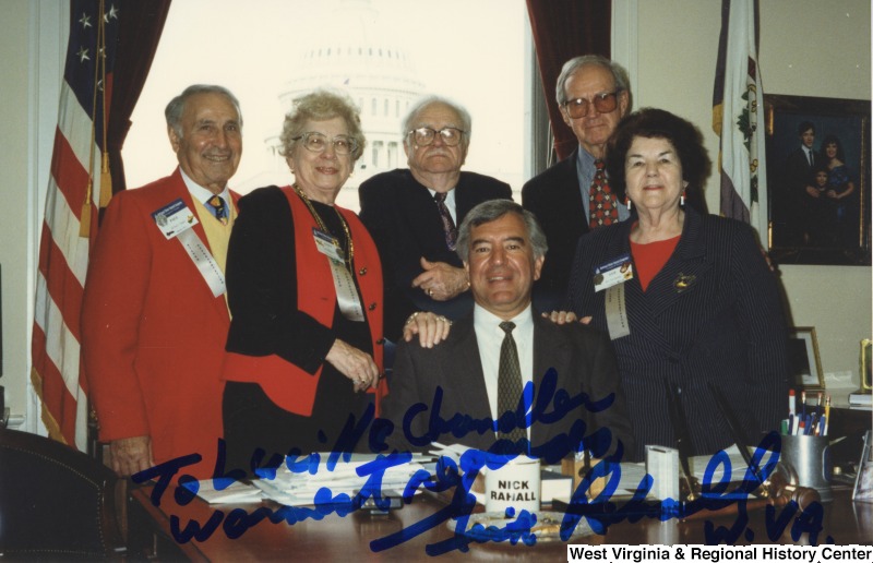 Congressman Nick Rahall (D-WV) with a group of unidentified Silver Hair Congress members in his D.C. office. The photograph is signed: "To Lucille Chandler, Warmest regards, Nick Rahall W.Va."