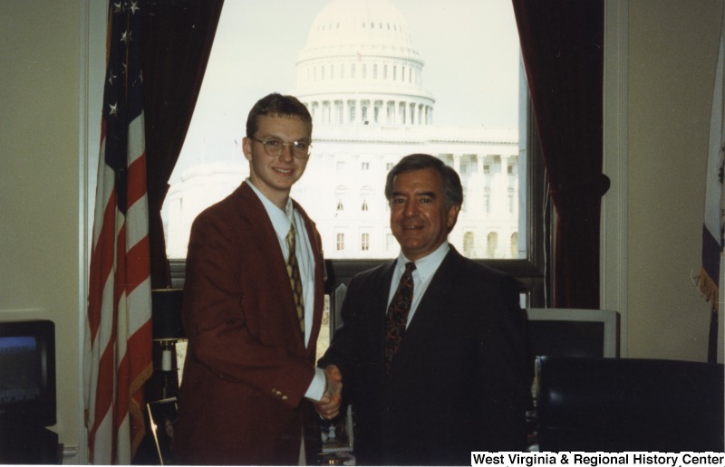 Congressman Nick Rahall (D-WV) with an unidentified man in his D.C. office.