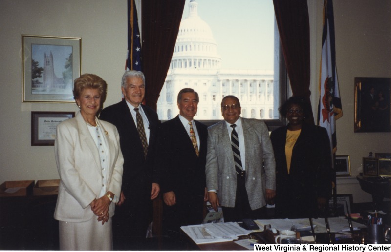 Congressman Nick Rahall (D-WV) with a group of unidentified people in his D.C. office.
