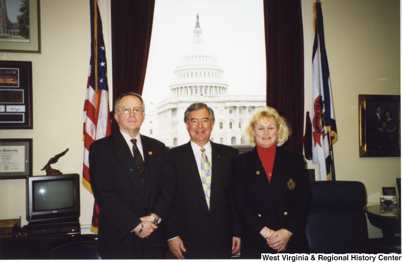 Congressman Nick Rahall (D-WV) with two unidentified people in his D.C. office.