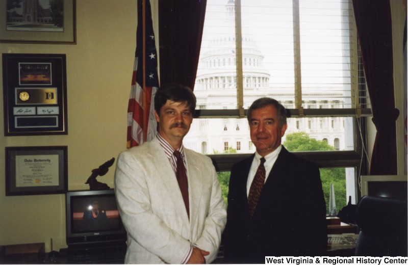 Congressman Nick Rahall (D-WV) with an unidentified man in his D.C. office.