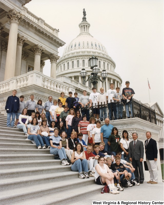 Congressman Nick Rahall (D-WV) with unidentified Webster Spring Junior High students in front of the United States Capitol building.