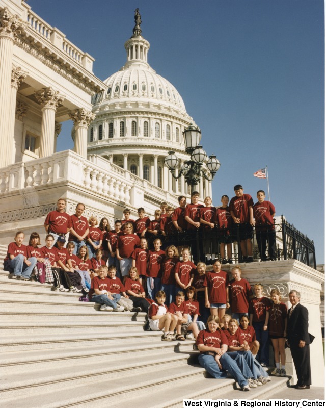 Congressman Nick Rahall (D-WV) with unidentified Alderson Elementary School students in front of the United States Capitol building.