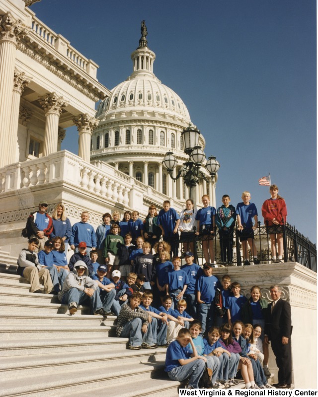 Congressman Nick Rahall (D-WV) with unidentified Lewisburg Elementary School students in front of the United States Capitol building.