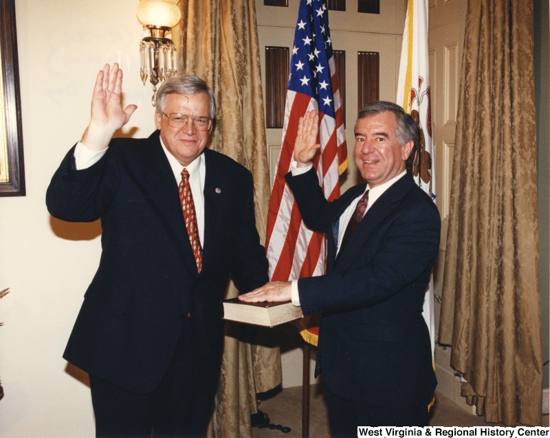 Congressman Nick Rahall (D-WV) getting sworn in to his twelfth term by Speaker of the House Dennis Hastert (R-IL) on the Opening Day of the 106th  Congress.