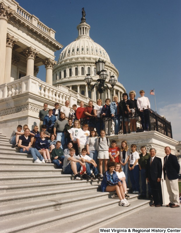 Congressman Nick Rahall (D-WV) with unidentified St. Joseph High School students in front of the United States Capitol building.