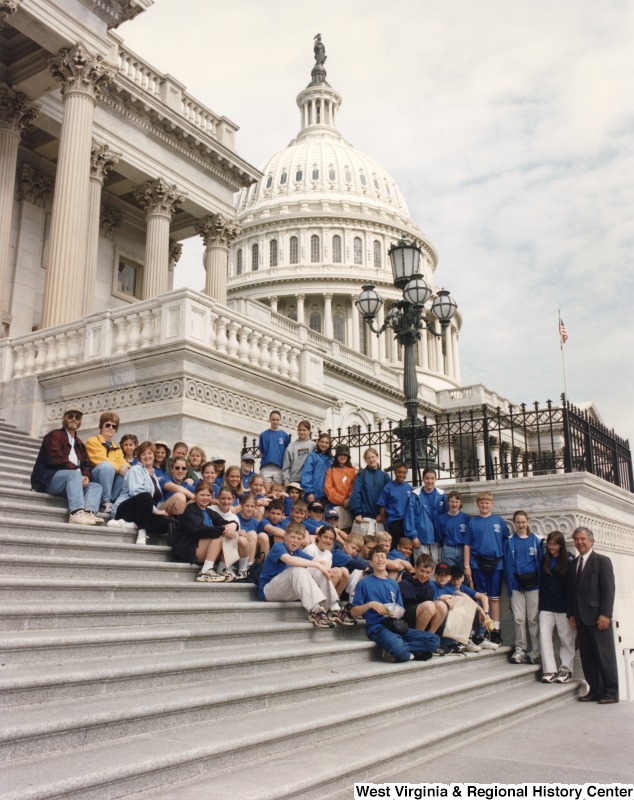 Congressman Nick Rahall (D-WV) with unidentified Lewisburg Elementary School students in front of the United States Capitol building.