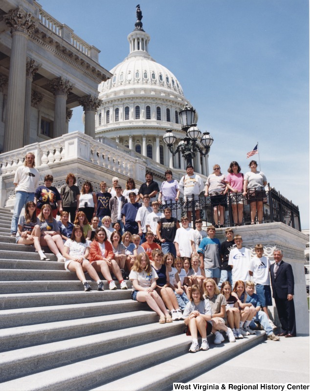 Congressman Nick Rahall (D-WV) with unidentified Glade Junior High School students in front of the United States Capitol building.