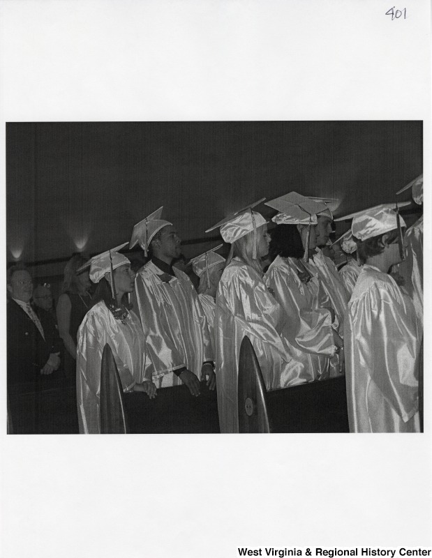 On the left, Suzanne Rahall stands with a group of classmates for her graduation ceremony.