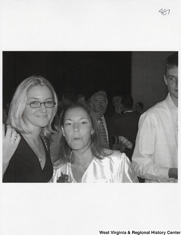 Suzanne Rahall with an unidentified young woman. Representative Nick J. Rahall (D-W.Va.)  is in the background.