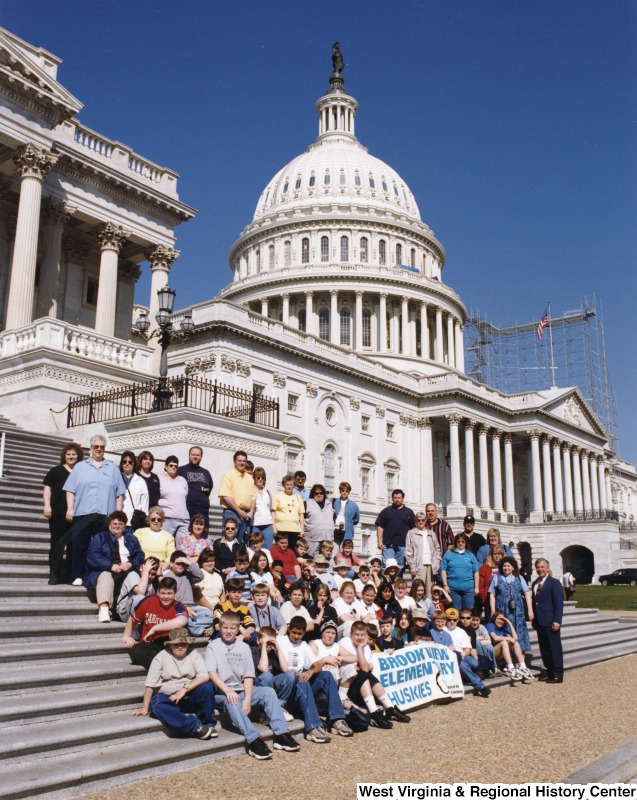 On the far right, Representative Nick J. Rahall (D-W.Va.) stands in front of the Capitol building with students from Brookview Elementary School.