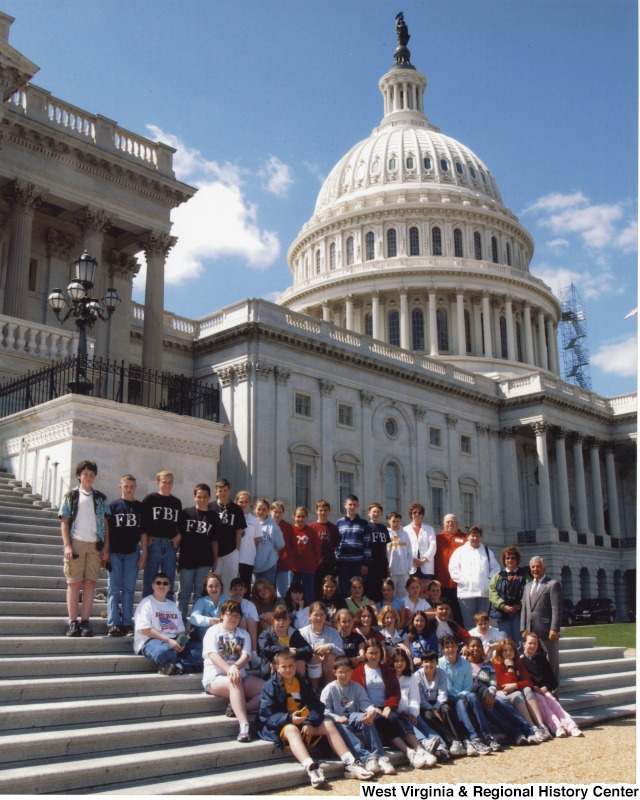 Congressman Nick Rahall (D-WV) with unidentified White Sulphur Springs Elementary School students in front of the United States Capitol building.